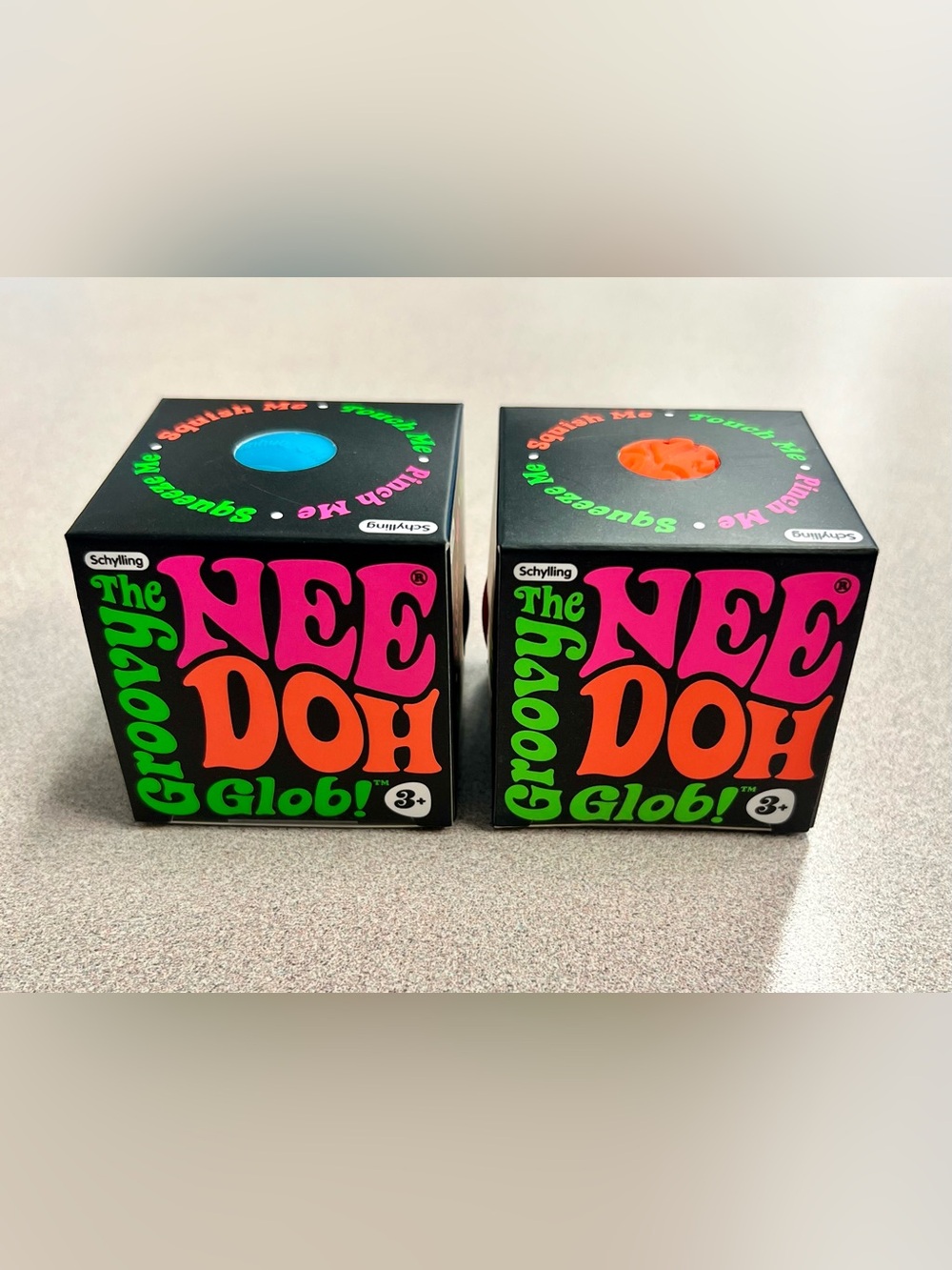 Schylling The NeeDoh Groovy Glob! Neon Blue & Neon Orange (Set of 2)